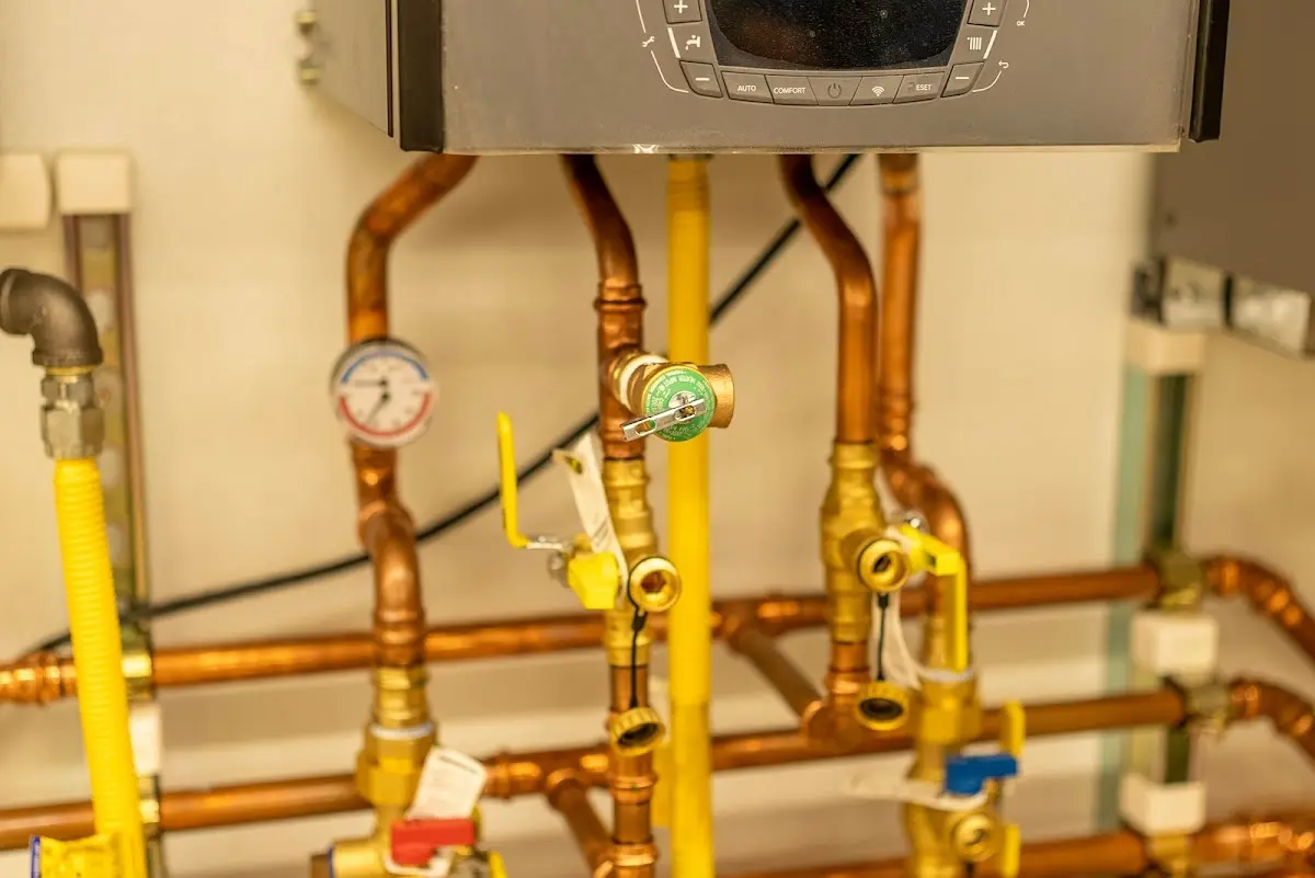 Licensed technician providing Water Heater Installation for a homeowner in Howard